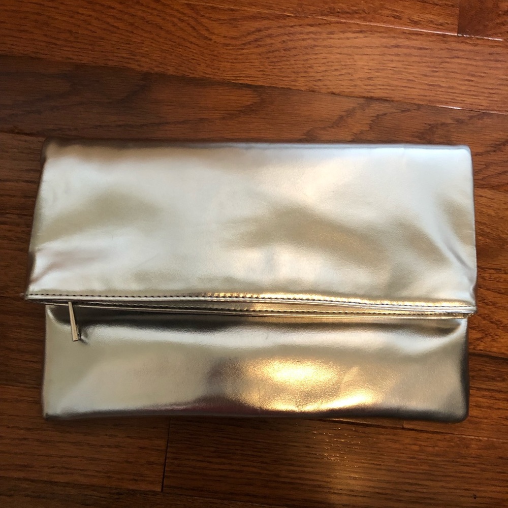 Metallic silver clutch